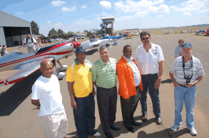 Delegation from Sedibeng including (l-r) ED Manele, MMC Simon Maphala, MM Yunus Chamda and Mayor Mofokeng with Mr Sybrandt Nel, the Chairperson of the Unitas Flying School at the Vereeniging Airport